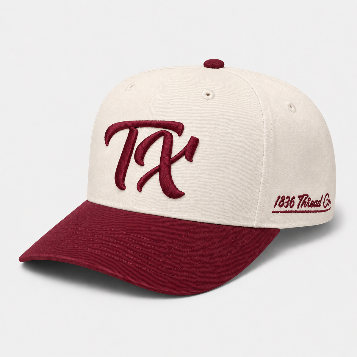 Beige TX snapback with maroon visor, embroidered TX front